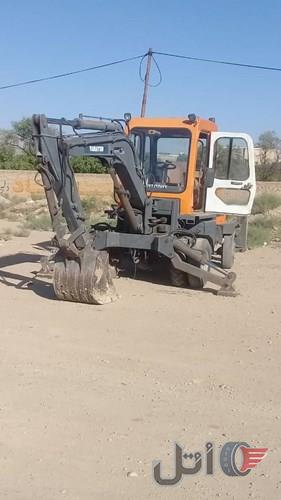 مینی بیل مکانیکی چرخ لاستیکی