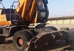 بیل مکانیکی چرخ لاستیکی