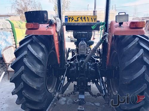 یک تراکتور ۲۸۵مدل۸۵.یک بارکش و یک گاو آهن.