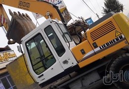 بیل آ۹۰۰چرخ لاستیکی