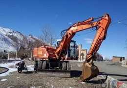بیل مکانیکی اطلس 1404 درحد