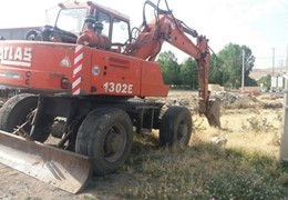 بیل مکانیکی اطلس ۳۰۲